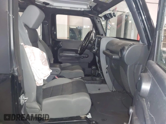 2007 Jeep Wrangler X with VIN 1J8FA24167L230763, listed as a IAAI auction lot 41876090 with 130,136 mi miles and . Bid and sale history available at carsss.com. Image 5.