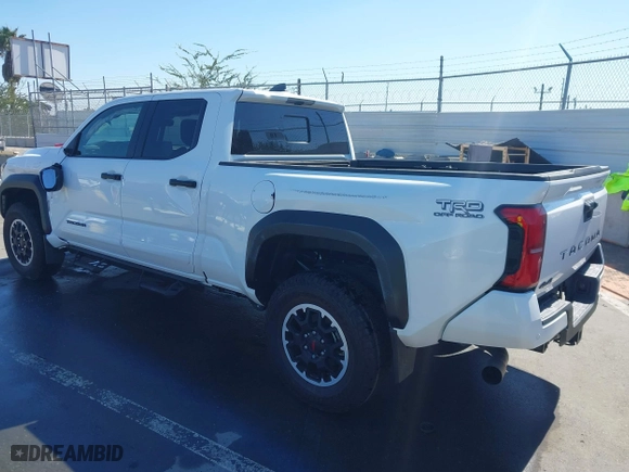 2024 Toyota Tacoma 4WD SR5 with VIN 3TMLB5JN1RM050446, listed as a IAAI auction lot 41658922 with 9,369 mi miles. Bid and sale history available at carsss.com. Image 3.