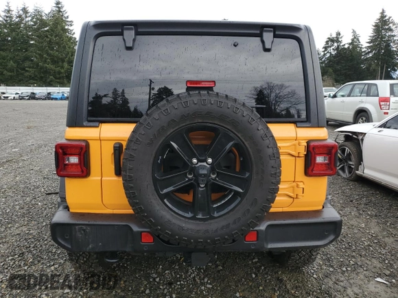 2021 Jeep Wrangler Unlimited Willys with VIN 1C4HJXDMXMW658305, listed as a Copart auction lot 85658534 with 65,653 mi miles and Salvage title. Bid and sale history available at DreamBid. Image 6.