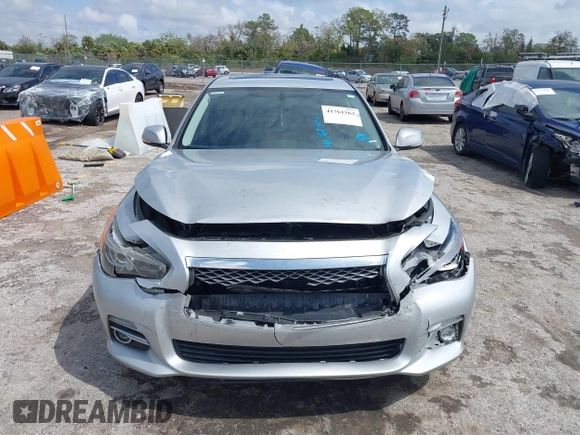 2014 Infiniti Q50 Premium z VIN JN1BV7AP9EM690381, wystawiony jako IAAI lot #41761562 z przebiegiem 107 099 mil mil oraz . Historia ofert i sprzedaży dostępna na DreamBid. Obrazek 12.