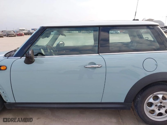 2013 MINI Cooper Hardtop with VIN WMWSU3C58DT683217, listed as a IAAI auction lot 41787402 with 148,803 mi miles. Bid and sale history available at carsss.com. Image 14.