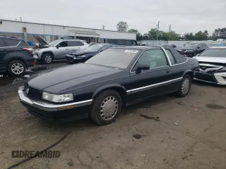 1994 Cadillac Eldorado Touring ETC z VIN 1G6ET1294RU619644, wystawiony jako Copart lot #58702965 z przebiegiem 105 160 mil mil oraz Szkoda całkowita • Salvage title. Historia ofert i sprzedaży dostępna na DreamBid. Obrazek 1.