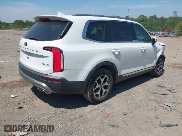 2020 Kia Telluride EX with VIN 5XYP34HC5LG008668, listed as a IAAI auction lot 42063077 with 59,480 mi miles and . Bid and sale history available at DreamBid. Image 4.