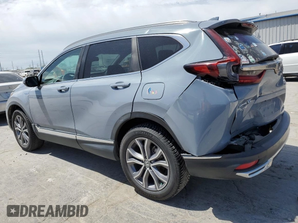 2020 Honda CR-V Touring z VIN 7FART6H93LE013954, wystawiony jako Copart lot #56970555 z przebiegiem 134 931 mil mil oraz Szkoda całkowita • Salvage title. Historia ofert i sprzedaży dostępna na DreamBid. Obrazek 2.