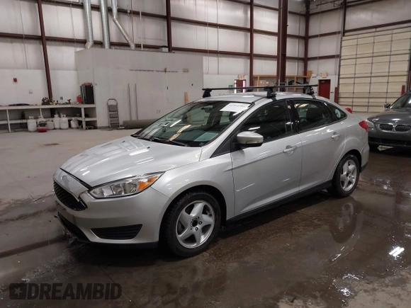 2015 Ford Focus SE with VIN 1FADP3F28FL231684, listed as a IAAI auction lot 41914284 with 100,195 mi miles. Bid and sale history available at carsss.com. Image 2.