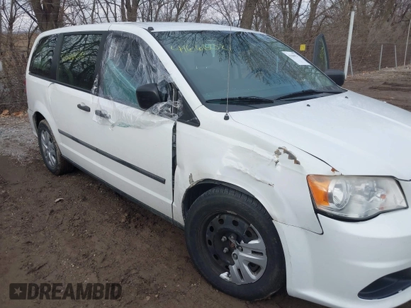 2014 Dodge Grand Caravan SE with VIN 2C4RDGBG9ER283848, listed as a IAAI auction lot 41666021 with 120,351 mi miles and . Bid and sale history available at DreamBid. Image 6.