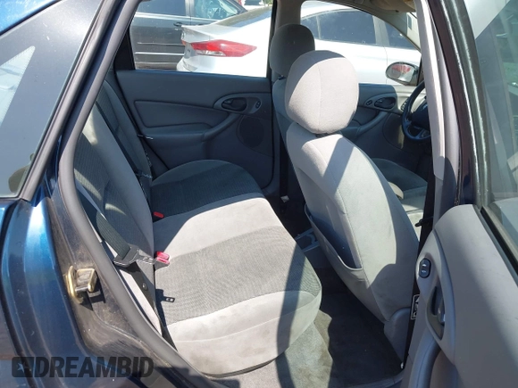 2003 Ford Focus SE with VIN 1FAFP34P23W313184, listed as a IAAI auction lot 42684410 with 77,248 mi miles and . Bid and sale history available at DreamBid. Image 8.