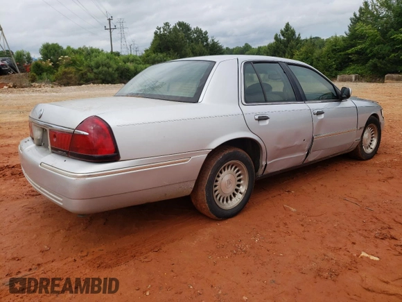 1999 Mercury Grand Marquis LS z VIN 2MEFM75W3XX617388, wystawiony jako Copart lot #58811195 z przebiegiem 162 600 mil mil oraz Szkoda całkowita • Salvage title. Historia ofert i sprzedaży dostępna na DreamBid. Obrazek 3.