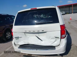 2013 Dodge Grand Caravan SXT with VIN 2C4RDGCG2DR522136, listed as a IAAI auction lot 42023561 with 176,635 mi miles and . Bid and sale history available at DreamBid. Image 16.