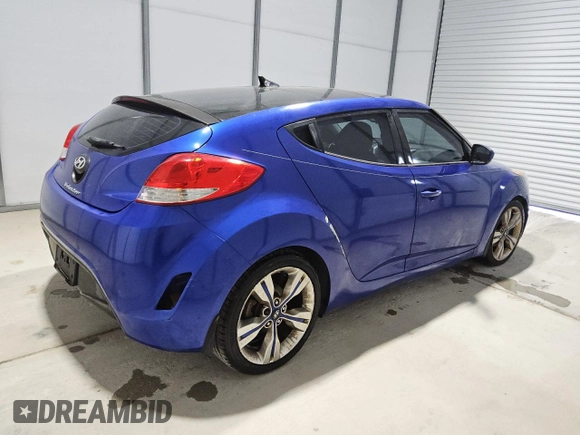 2013 Hyundai Veloster w/Black Int z VIN KMHTC6AD2DU125066, wystawiony jako Copart lot #60921325 z przebiegiem 189 503 mil mil oraz Czysty tytuł • Clean title. Historia ofert i sprzedaży dostępna na DreamBid. Obrazek 3.