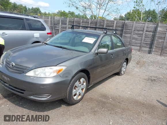2002 Toyota Camry LE z VIN JTDBE32KX20070778, wystawiony jako IAAI lot #42389584 z przebiegiem 278 070 mil mil oraz . Historia ofert i sprzedaży dostępna na DreamBid. Obrazek 2.