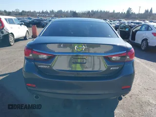 2016 Mazda 6 i Sport with VIN JM1GJ1U53G1400940, listed as a IAAI auction lot 41687400 with 77,737 mi miles and . Bid and sale history available at DreamBid. Image 16.
