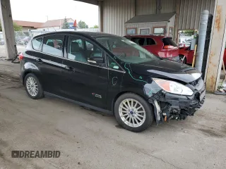 2016 Ford C-Max Energi SEL with VIN 1FADP5CU7GL101284, listed as a Copart auction lot 63846573 with 134,502 mi miles. Bid and sale history available at carsss.com. Image 4.