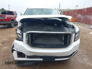 2016 GMC Yukon Denali with VIN 1GKS1CKJ7GR237852, listed as a IAAI auction lot 41944398 with 65,703 mi miles. Bid and sale history available at carsss.com. Image 6.