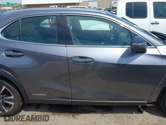 2021 Lexus UX 250h with VIN JTHP9JBH1M2040593, listed as a IAAI auction lot 42024493 with 33,394 mi miles and . Bid and sale history available at DreamBid. Image 14.