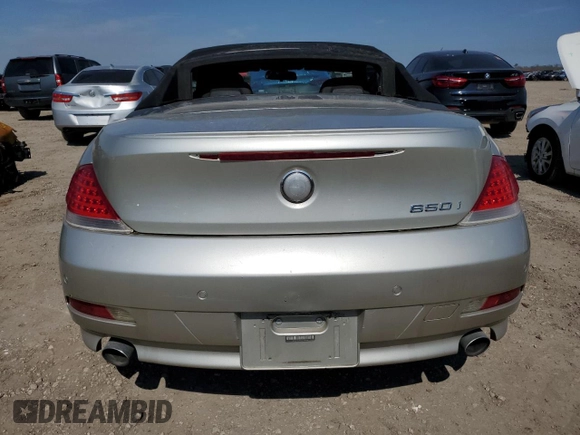 2006 BMW 6 Series 650Ci z VIN WBAEK13416CN78990, wystawiony jako Copart lot #47316205 z przebiegiem 99 173 mil mil oraz Czysty tytuł • Clean title. Historia ofert i sprzedaży dostępna na DreamBid. Obrazek 6.