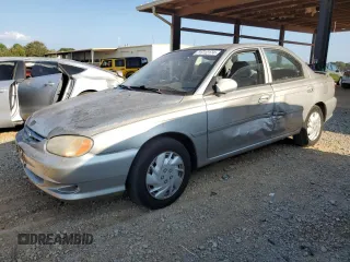 2001 Kia Sephia with VIN KNAFB121715014673, listed as a Copart auction lot 71712174 with 83,277 mi miles and Salvage Title. Bid and sale history available at DreamBid. Image 1.