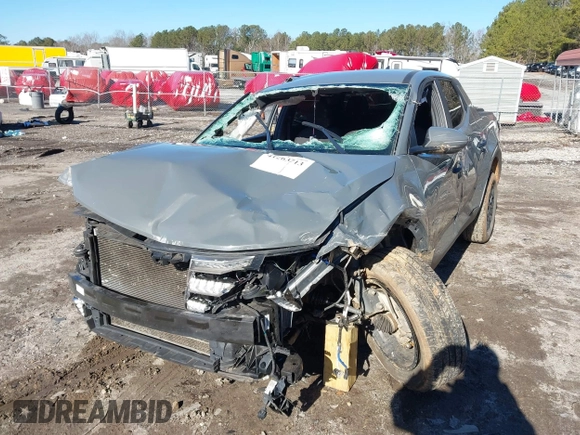 2022 Hyundai Santa Cruz SEL with VIN 5NTJB4AE7NH014148, listed as a IAAI auction lot 41263713 with 70,619 mi miles and . Bid and sale history available at DreamBid. Image 6.