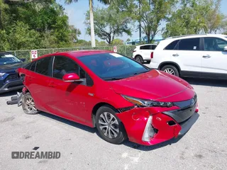 2021 Toyota Prius LE with VIN JTDKAMFP1M3173015, listed as a IAAI auction lot 41759123 with 25,299 mi miles and . Bid and sale history available at DreamBid. Image 1.