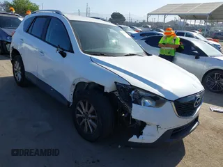 2013 Mazda CX-5 Sport with VIN JM3KE2BE4D0153251, listed as a IAAI auction lot 42297235 with 177,019 mi miles and . Bid and sale history available at DreamBid. Image 1.