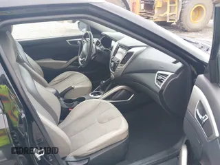 2012 Hyundai Veloster w/Gray Int with VIN KMHTC6AD4CU062034, listed as a IAAI auction lot 42371790 with 116,861 mi miles and . Bid and sale history available at DreamBid. Image 5.
