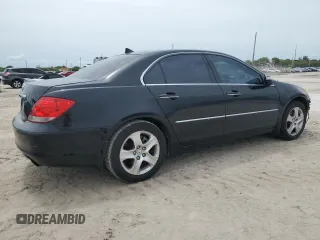 2005 Acura RL z VIN JH4KB16535C018850, wystawiony jako Copart lot #59306055 z przebiegiem 131 881 mil mil oraz Szkoda całkowita • Salvage title. Historia ofert i sprzedaży dostępna na DreamBid. Obrazek 3.