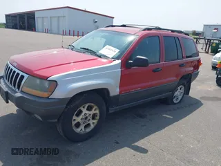 2001 Jeep Grand Cherokee Laredo with VIN 1J4GW48S81C727262, listed as a IAAI auction lot 42402470 with 228,167 mi miles and . Bid and sale history available at DreamBid. Image 2.