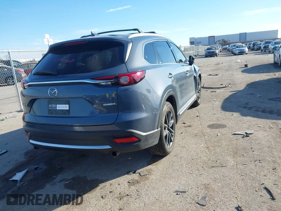 2022 Mazda CX-9 Grand Touring with VIN JM3TCBDYXN0625567, listed as a IAAI auction lot 41327380 with 50,672 mi miles and . Bid and sale history available at DreamBid. Image 4.