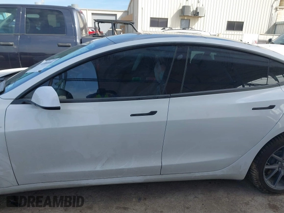 2019 Tesla Model 3 Mid Range with VIN 5YJ3E1EA6KF464615, listed as a IAAI auction lot 41306600 with 79,478 mi miles and . Bid and sale history available at DreamBid. Image 13.
