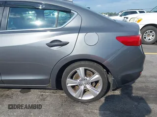 2014 Acura ILX z VIN 19VDE1F39EE002881, wystawiony jako IAAI lot #42270605 z przebiegiem 172 356 mil mil oraz . Historia ofert i sprzedaży dostępna na DreamBid. Obrazek 20.