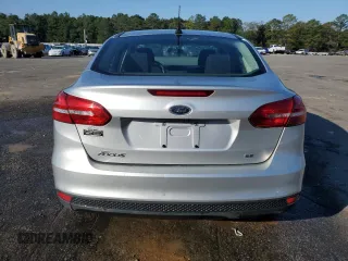 2017 Ford Focus SE with VIN 1FADP3F28HL315779, listed as a Copart auction lot 82608154 with 143,902 mi miles and Salvage title. Bid and sale history available at DreamBid. Image 6.