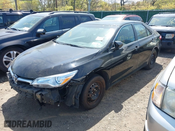 2015 Toyota Camry LE z VIN 4T1BD1FK7FU159767, wystawiony jako IAAI lot #42175153 z przebiegiem Nie podano mil oraz . Historia ofert i sprzedaży dostępna na DreamBid. Obrazek 17.