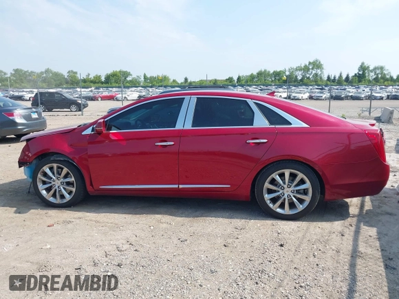 2013 Cadillac XTS Luxury z VIN 2G61P5S34D9139924, wystawiony jako IAAI lot #42504191 z przebiegiem 140 744 mil mil oraz . Historia ofert i sprzedaży dostępna na DreamBid. Obrazek 14.