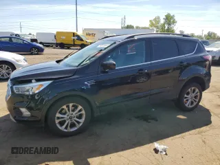 2017 Ford Escape SE z VIN 1FMCU0GD5HUD52467, wystawiony jako Copart lot #70616944 z przebiegiem 115 876 mil mil oraz Szkoda całkowita • Salvage title. Historia ofert i sprzedaży dostępna na DreamBid. Obrazek 1.