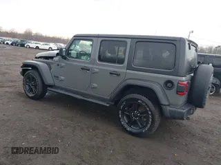 2021 Jeep Wrangler Unlimited Sport S with VIN 1C4HJXDG5MW614688, listed as a IAAI auction lot 41678964 with 89,309 mi miles. Bid and sale history available at carsss.com. Image 3.