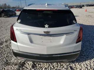 2022 Cadillac XT5 FWD Premium Luxury with VIN 1GYKNCRS1NZ125487, listed as a Copart auction lot 42081675 with 67,702 mi miles and Salvage title. Bid and sale history available at DreamBid. Image 6.