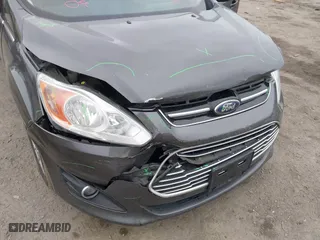 2015 Ford C-Max Energi SEL with VIN 1FADP5CU7FL121209, listed as a IAAI auction lot 41621034 with 145,648 mi miles. Bid and sale history available at carsss.com. Image 12.