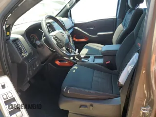 2022 Nissan Frontier Pro-X z VIN 1N6ED1EJ7NN616562, wystawiony jako Copart lot #62711855 z przebiegiem 19 579 mil mil oraz Szkoda całkowita • Salvage title. Historia ofert i sprzedaży dostępna na DreamBid. Obrazek 7.