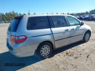 2005 Honda Odyssey LX with VIN 5FNRL382X5B097268, listed as a IAAI auction lot 40809971 with 286,685 mi miles and . Bid and sale history available at DreamBid. Image 4.