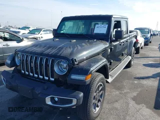 2020 Jeep Gladiator Overland with VIN 1C6HJTFG7LL139980, listed as a IAAI auction lot 40713794 with 33,560 mi miles and . Bid and sale history available at DreamBid. Image 18.
