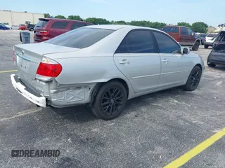 2005 Toyota Camry LE with VIN 4T1BE30K35U572110, listed as a IAAI auction lot 42674324 with 147,480 mi miles and . Bid and sale history available at DreamBid. Image 4.
