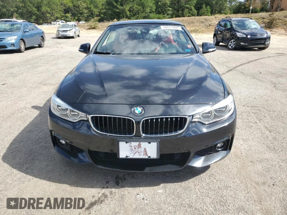 2014 BMW 4 Series 435i with VIN WBA3T3C59EP736749, listed as a Copart auction lot 76011404 with 48,815 mi miles and Salvage title. Bid and sale history available at DreamBid. Image 5.