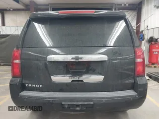 2015 Chevrolet Tahoe LT z VIN 1GNSCBKC1FR228488, wystawiony jako IAAI lot #41933869 z przebiegiem 164 523 mil mil oraz . Historia ofert i sprzedaży dostępna na DreamBid. Obrazek 17.