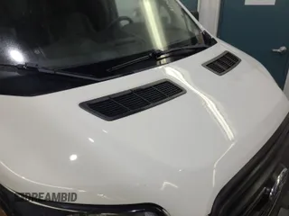 2016 Ford Transit Cargo with VIN 1FTYE1YM9GKB19505, listed as a IAAI auction lot 42774251 with 252,184 mi miles and . Bid and sale history available at DreamBid. Image 1.