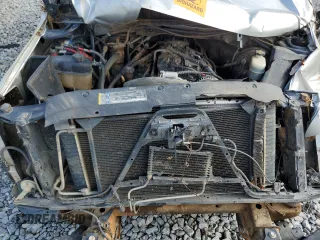 2010 Chevrolet Tahoe LT z VIN 1GNUCBE05AR189634, wystawiony jako Copart lot #56297945 z przebiegiem 292 816 mil mil oraz Szkoda całkowita • Salvage title. Historia ofert i sprzedaży dostępna na DreamBid. Obrazek 12.