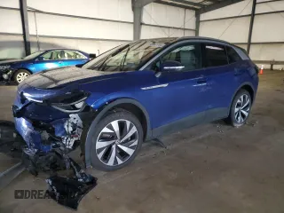 2021 Volkswagen ID.4 Pro S with VIN WVGUNPE2XMP061550, listed as a Copart auction lot 82867704 with 0 mi miles and Salvage Title. Bid and sale history available at carsss.com. Image 1.