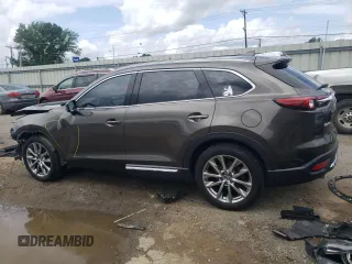2018 Mazda CX-9 Grand Touring с VIN JM3TCADY9J0205299, выставлен на аукционе Copart как лот 60306095 с пробегом 113 766 миль миль и Списание • Salvage title. История ставок и продаж доступна на DreamBid. Изображение 2.