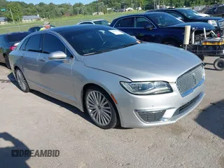 2017 Lincoln MKZ Reserve z VIN 3LN6L5FCXHR614934, wystawiony jako IAAI lot #42301724 z przebiegiem 88 616 mil mil oraz . Historia ofert i sprzedaży dostępna na DreamBid. Obrazek 1.