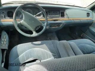 1996 Ford Crown Victoria LX с VIN 2FALP74W1TX192976, выставлен на аукционе Copart как лот 56104895 с пробегом 144 011 миль миль и Списание • Salvage title. История ставок и продаж доступна на DreamBid. Изображение 8.