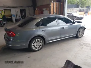 2016 Volkswagen Passat 1.8T SE with VIN 1VWBT7A35GC011129, listed as a IAAI auction lot 39977788 with 123,007 mi miles. Bid and sale history available at carsss.com. Image 4.